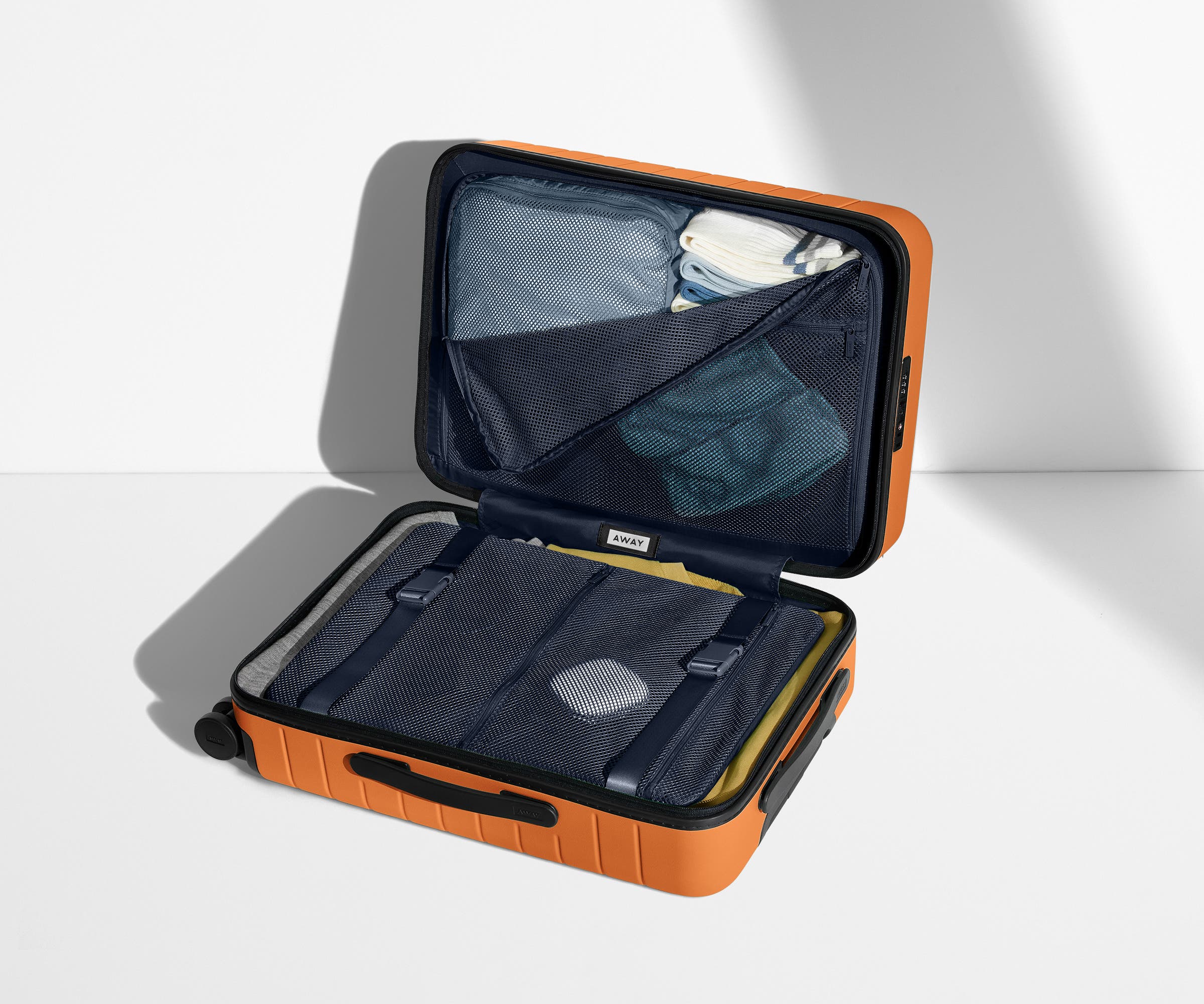 The Bigger Carry-On in Sorbet Orange